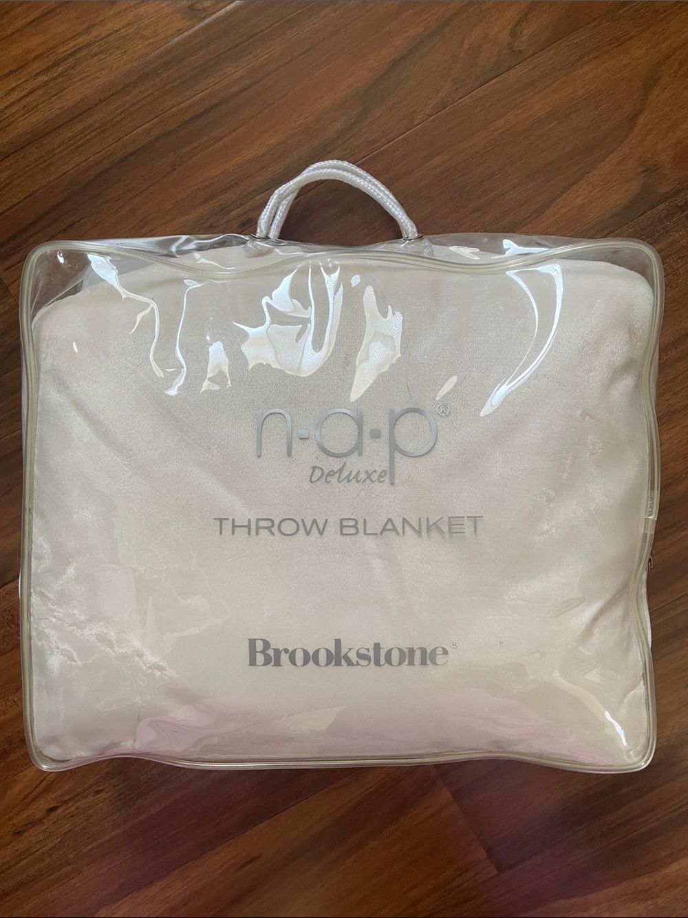 Brookstone n•a•p Deluxe Throw Blanket in Cream